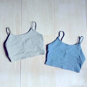 Two long-line sports tanks